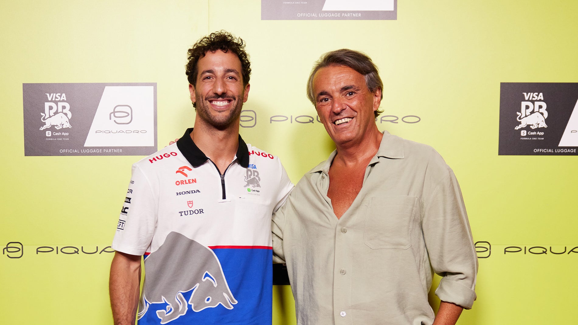 Marco Palmieri, founder di Piquadro, e Daniel Ricciardo, pilota di F1 per RC, all'evento Piquadro a Milano