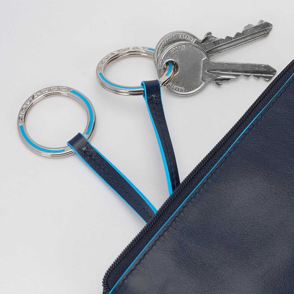 Two-ring key case with zipped rear pocket