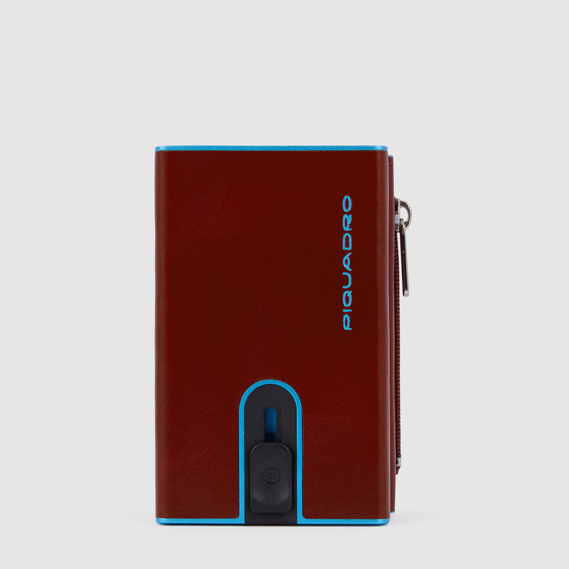 Compact wallet with sliding system and coin pocket