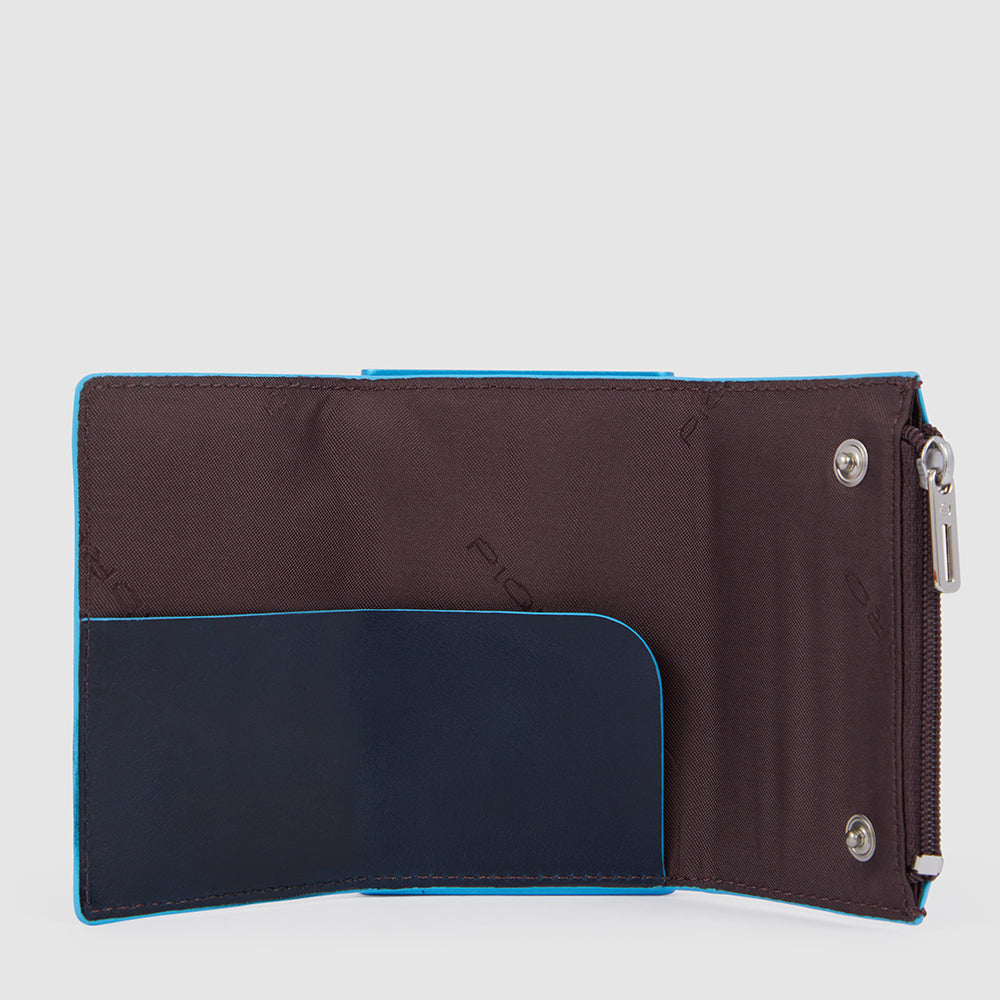 Compact wallet with sliding system and coin pocket