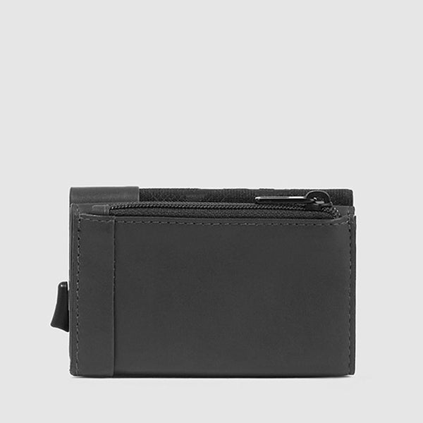 Compact wallet with sliding system and coin pocket