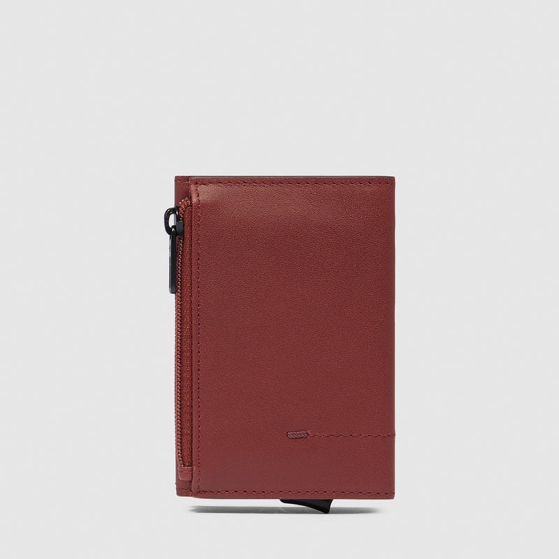 Compact wallet with sliding system and coin pocket